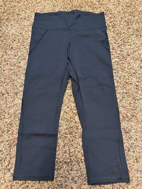 Athleta Black High-Rise Active Cropped Leggings with Side Pockets
